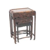 A SET OF THREE LATE 19TH CENTURY CHINESE HARDWOOD NESTING TABLES