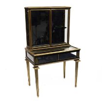 A 19TH CENTURY EBONISED AND BRASS-MOUNTED BIJOUTERIE CABINET