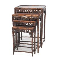 A SET OF FOUR LATE 19TH/ EARLY 20TH CENTURY CHINESE HARDWOOD NESTING TABLES