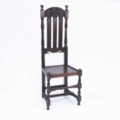 A 17TH CENTURY YORKSHIRE OAK HIGH-BACK CHAIR