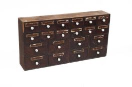 A BANK OF APOTHECARY DRAWERS