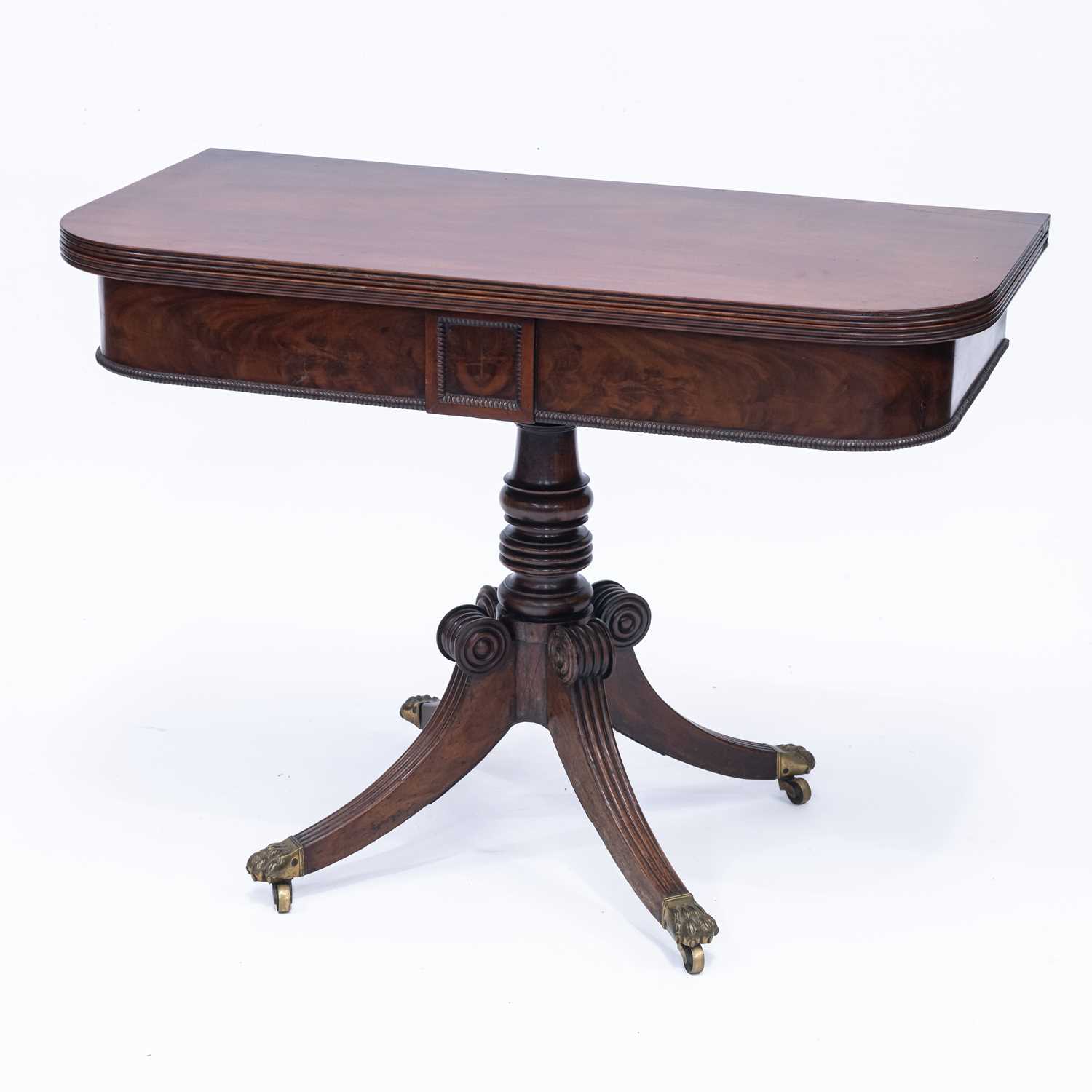 A REGENCY MAHOGANY FOLDOVER TEA TABLE