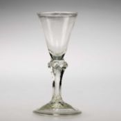 AN UNUSUALLY SMALL PEDESTAL STEM WINE GLASS, CIRCA 1770