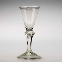 AN UNUSUALLY SMALL PEDESTAL STEM WINE GLASS, CIRCA 1770