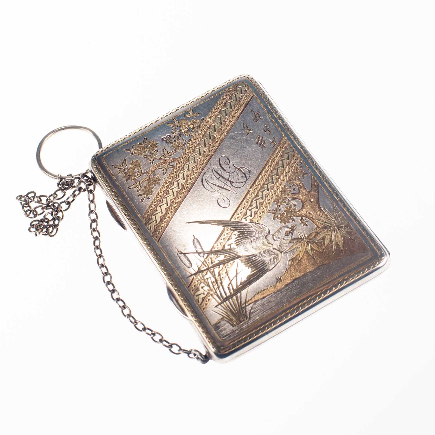 A VICTORIAN AESTHETIC MOVEMENT SILVER-GILT CARD CASE