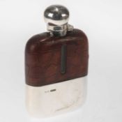 A GEORGE VI SILVER AND LEATHER-MOUNTED HIP FLASK