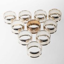 A SET OF TEN ELIZABETH II SILVER NAPKIN RINGS