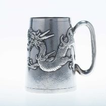 A CHINESE SILVER 'DRAGON' MUG