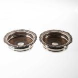 A PAIR OF VICTORIAN SILVER COASTERS