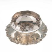 A LARGE STERLING SILVER BOWL AND DISH