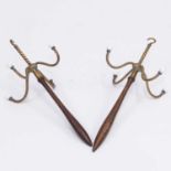 A PAIR OF EDWARDIAN BRASS AND MAHOGANY BARRISTERS WIG AND GOWN HANGERS