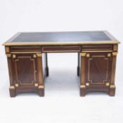 A LATE 19TH CENTURY CONTINENTAL GILT-BRASS MOUNTED MAHOGANY DESK, IN THE DIRECTOIRE STYLE