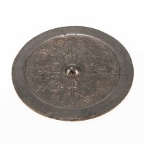 A CHINESE BRONZE MIRROR WITH SILVER PATINA, THREE KINGDOMS/WESTERN JIN DYNASTY