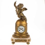A 19TH CENTURY FRENCH GILT-METAL MANTEL CLOCK