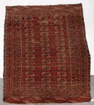 AN ANTIQUE TURKEMAN CARPET