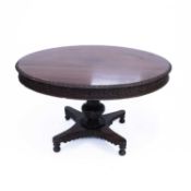 A GEORGE IV ANGLO-INDIAN PADOUK CENTRE TABLE