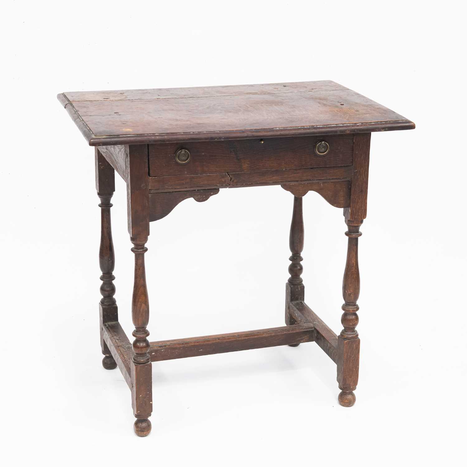 AN OAK SIDE TABLE, CIRCA 1700
