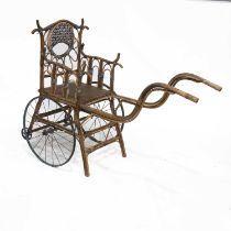 A VINTAGE CHILD'S BAMBOO AND WICKER RICKSHAW