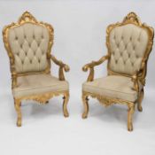 A LARGE PAIR OF LOUIS XV STYLE GILT AND UPHOLSTERED FAUTEUILS