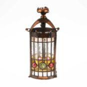 AN ARTS AND CRAFTS COPPER, LEADED AND STAINED GLASS LANTERN