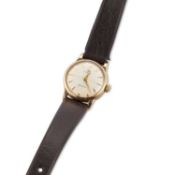 A LADY'S 9CT GOLD OMEGA STRAP WATCH