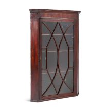 A GEORGE III MAHOGANY HANGING CORNER CABINET