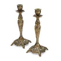 A PAIR OF AESTHETIC BRASS CANDLESTICKS