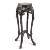 A CHINESE MARBLE-INSET HARDWOOD STAND, CIRCA 1900