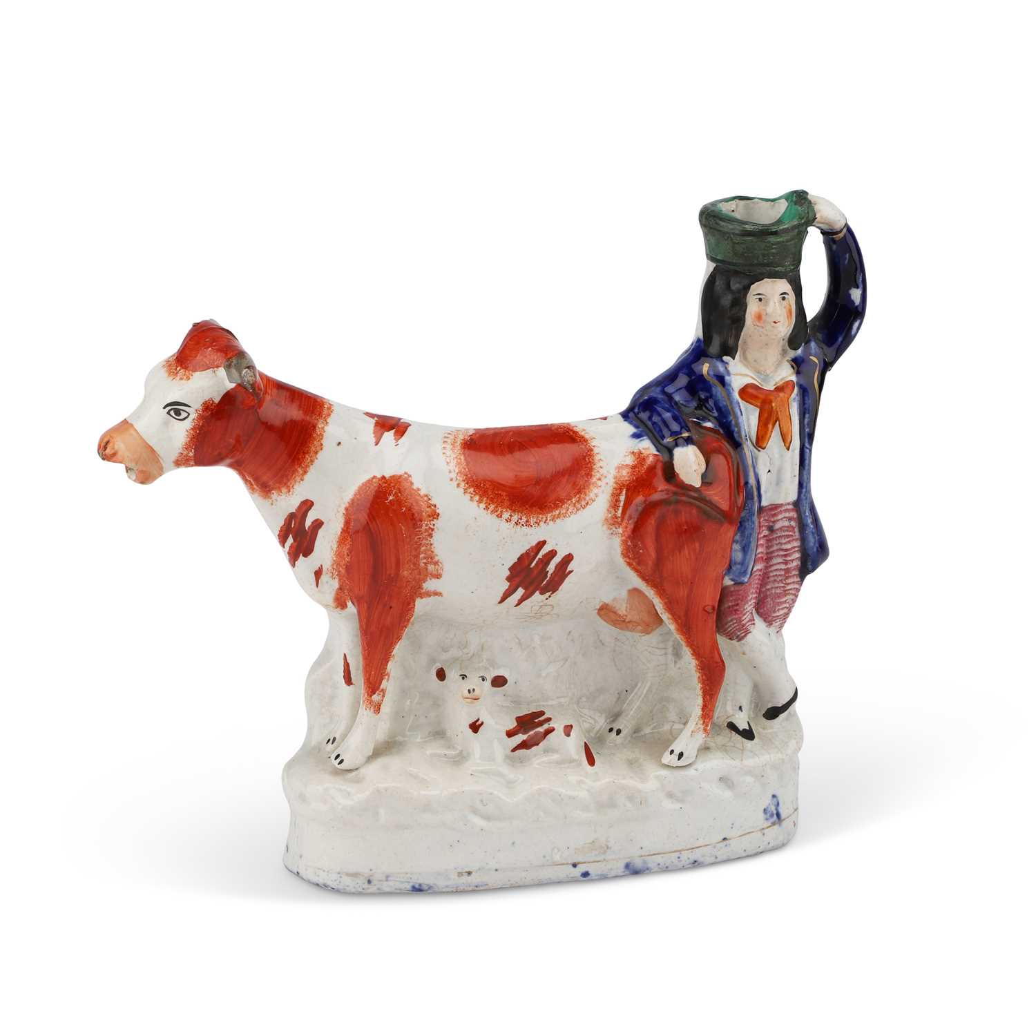 A 19TH CENTURY STAFFORDSHIRE COW CREAMER