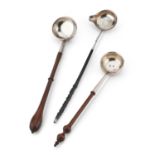 THREE 18TH CENTURY SILVER TODDY LADLES