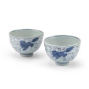 A PAIR OF CHINESE PORCELAIN BLUE AND WHITE 'LION-DOG' WINE CUPS, JIAJING/ WANLI PERIOD