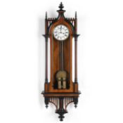 A 19TH CENTURY WALNUT AND EBONISED TWO-WEIGHT VIENNA WALL CLOCK
