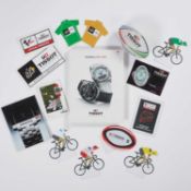A TISSOT STOCKIST CATALOGUE AND DISPLAY ITEMS