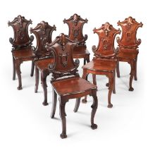A SET OF SIX EARLY VICTORIAN MAHOGANY HALL CHAIRS
