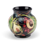 A MOORCROFT POTTERY 'QUEEN'S CHOICE' VASE BY EMMA BOSSONS