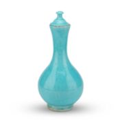 A TURQUOISE-GLAZED VASE AND COVER