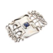 OLIVER BAKER FOR LIBERTY & CO, A SILVER AND LAPIS LAZULI BUCKLE