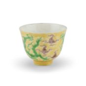 A CHINESE YELLOW-GROUND 'DRAGON' CUP