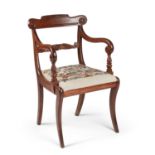 A REGENCY ROSEWOOD ELBOW CHAIR