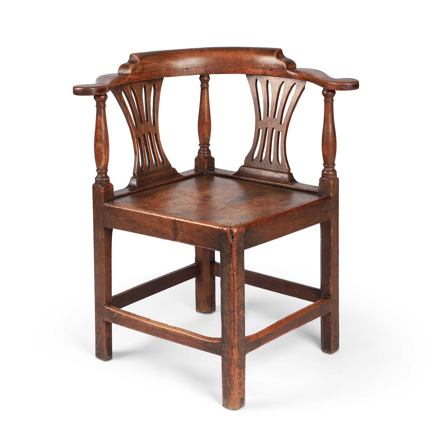 A GEORGE III OAK CORNER CHAIR