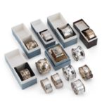 A COLLECTION OF THIRTEEN SILVER NAPKIN RINGS