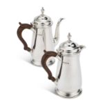 A GEORGE VI SILVER COFFEE POT AND MATCHING HOT WATER JUG