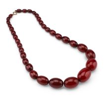 A CHERRY AMBER BAKELITE BEAD NECKLACE