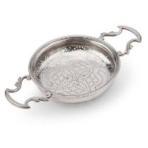 A GEORGE III SILVER TWO-HANDLED LEMON STRAINER