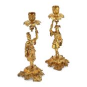 A PAIR OF 19TH CENTURY GILT-BRASS CHINOISERIE CANDLESTICKS