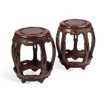 A PAIR OF CHINESE HARDWOOD BARREL-FORM SEATS