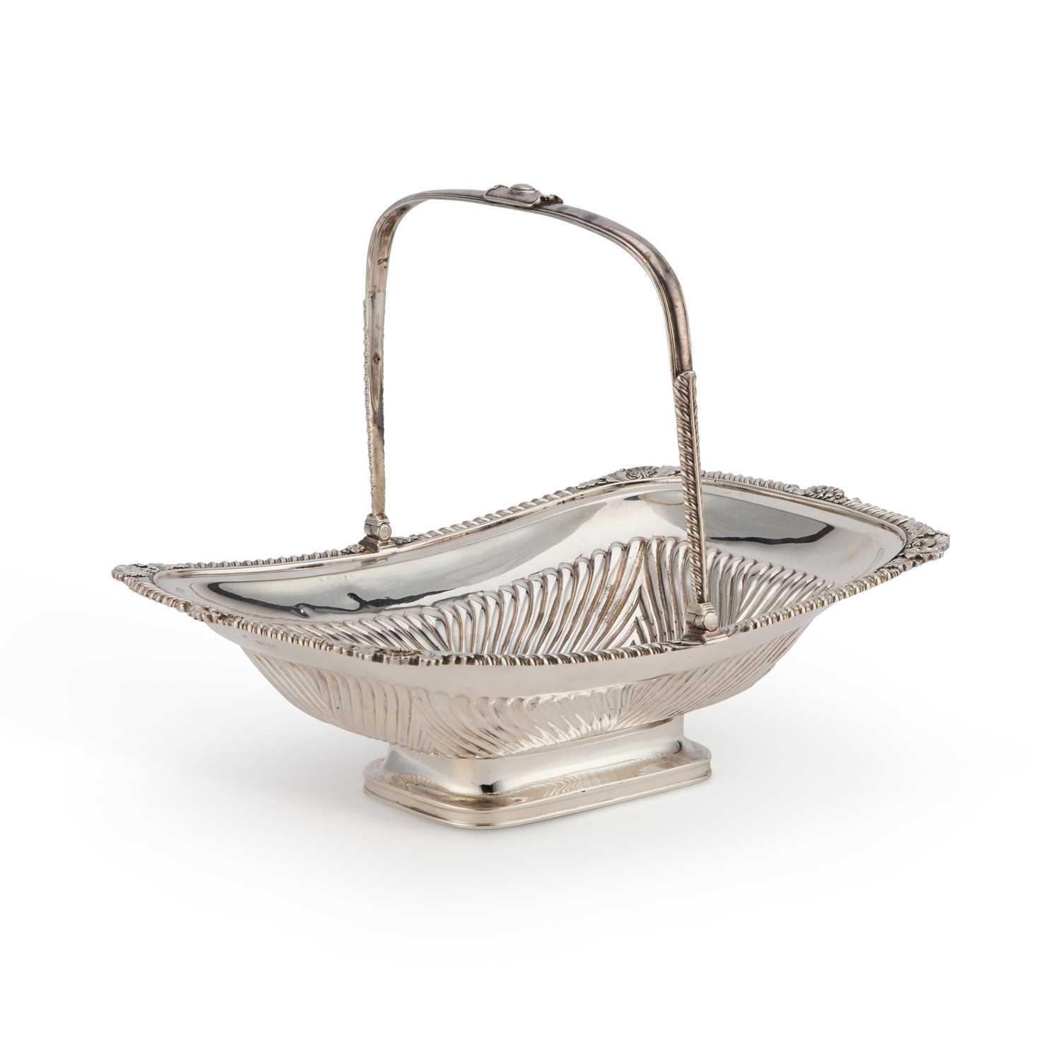 A GEORGE III SILVER CAKE BASKET