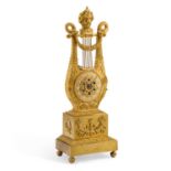 A 19TH CENTURY FRENCH ORMOLU LYRE MANTEL CLOCK