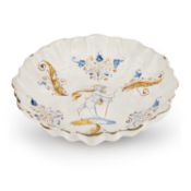 AN ITALIAN MAIOLICA 'COMPENDARIO' FOOTED DISH (CRESPINA), FAENZA, CIRCA 1600