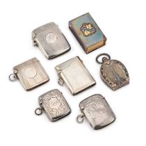 A COLLECTION OF SILVER VESTA CASES